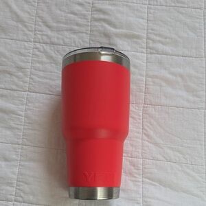 YETI Coral Tumbler with Silver Accents used